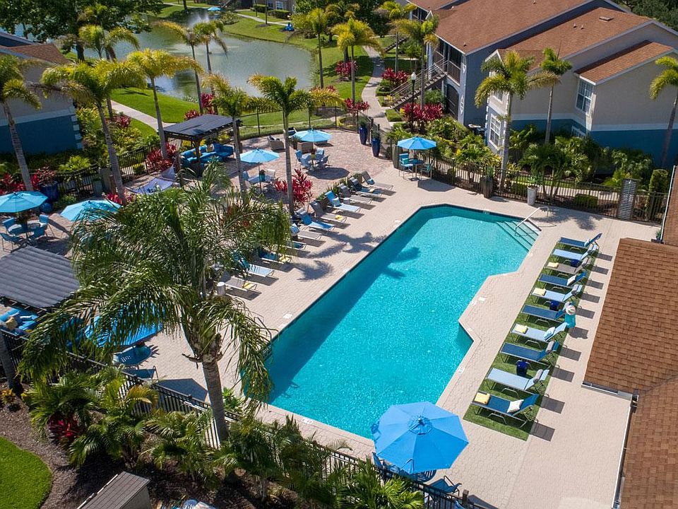 Our expansive sundeck/pool area includes plenty of loungers, tables with umbrellas, and other seating.