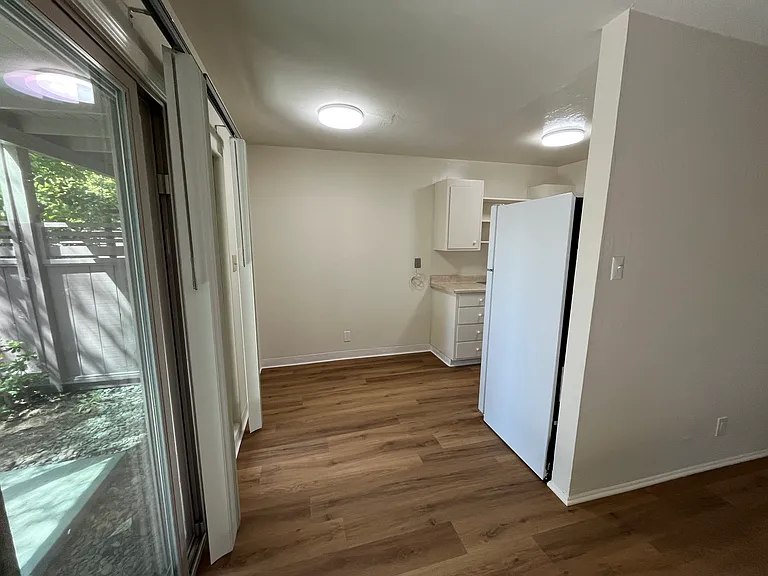 Looking from living room toward kitchen and dining area (downstairs Large 1BR)