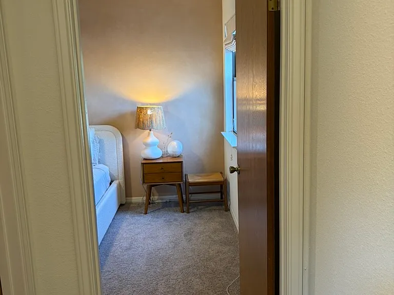 Hallway into second floor bedroom