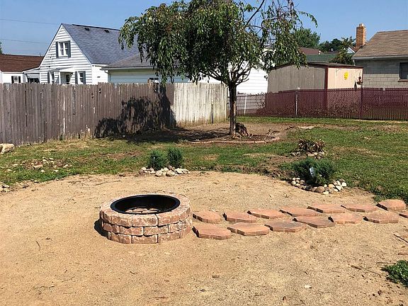 Nice level yard with fire pit