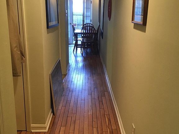 Hallway from bedrooms to kitchen and living room