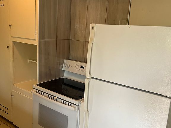 New back splash in appliance area.