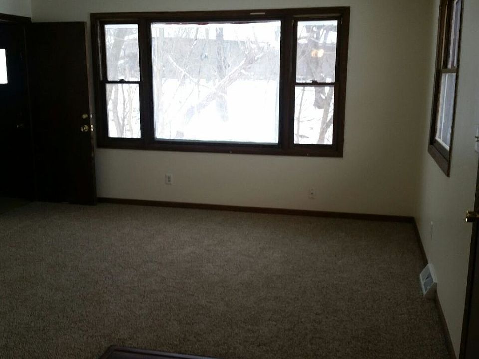 Living room with new carpet.