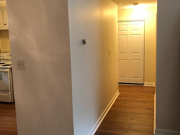 Hallway leading to bedroom and bathroom