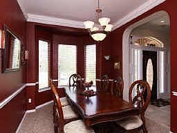 Formal Dining*Crown Moldings*Chair Railing* Upgraded Light Fixture*Designer Paint.