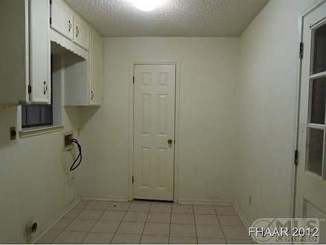 utility room with half bath