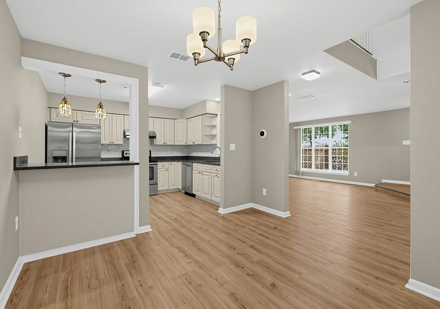 Bright End-Unit Home with Private Top-Floor Primary Suite — Photo 2