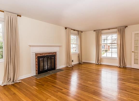 Lots of windows and gleaming hardwood floors