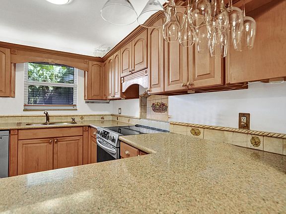 5th image of 9400 Live Oak Place #203