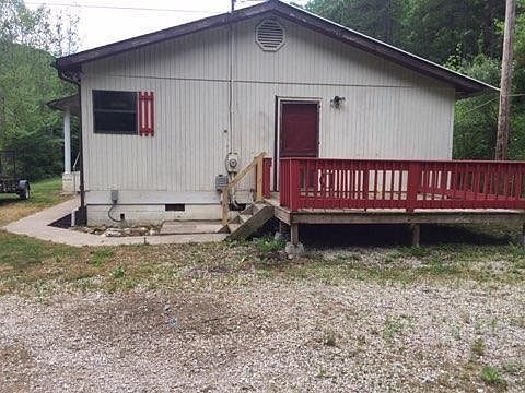 entry door and deck by driveway