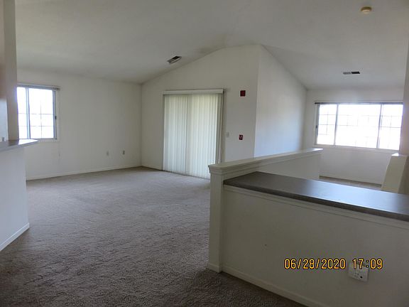 Living Room and Office/Den Area from Dining Area