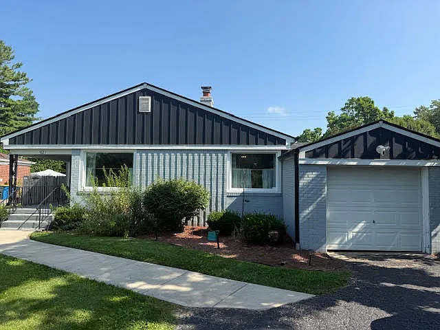 Brand new siding, room, and gutters!
