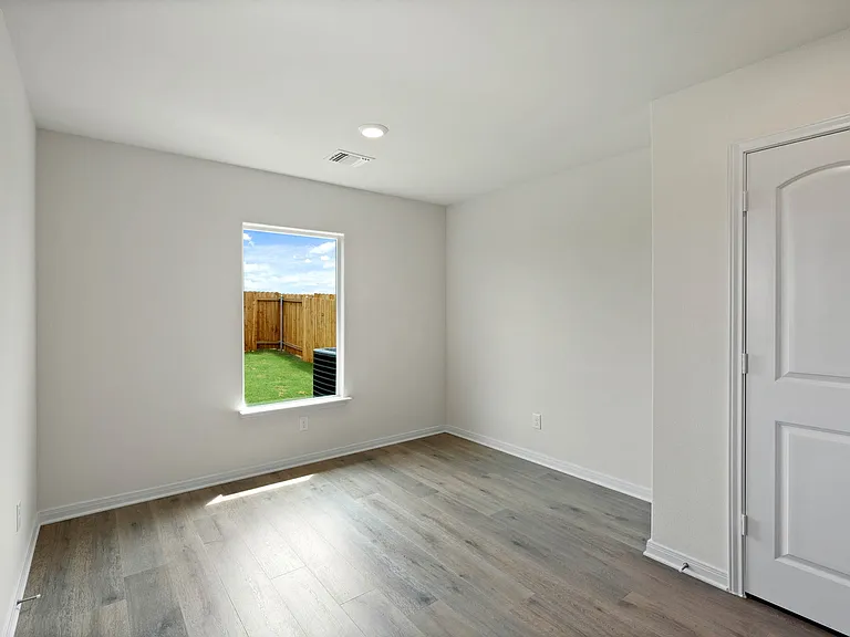 The dining room has a large window.