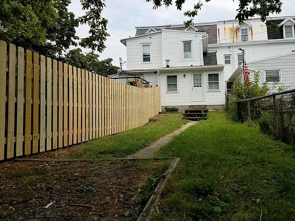 Rear Yard (new siding/fence)
