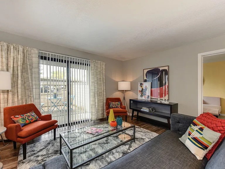 Living Room with View of Private Balcony