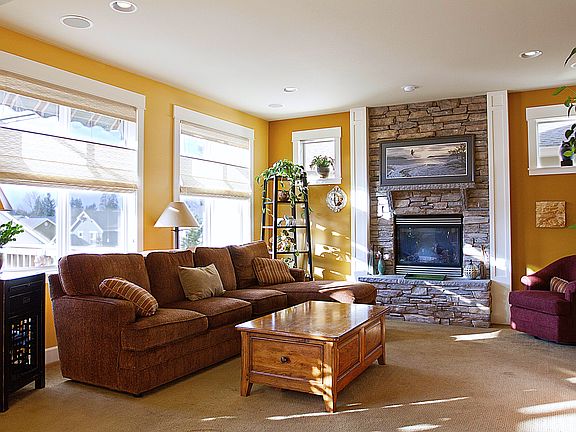 Amazing windows and upgraded stacked stone fireplace