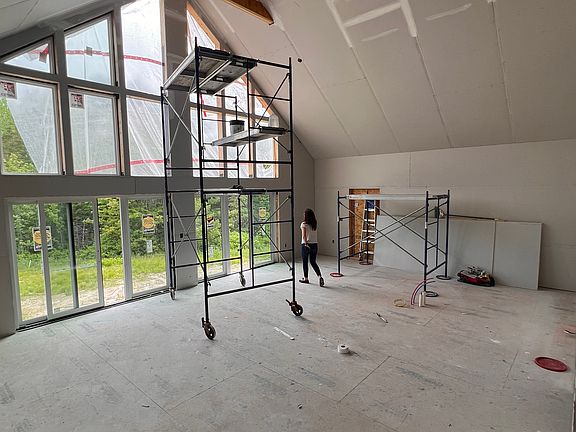 Living room, dining room and kitchen from the front door