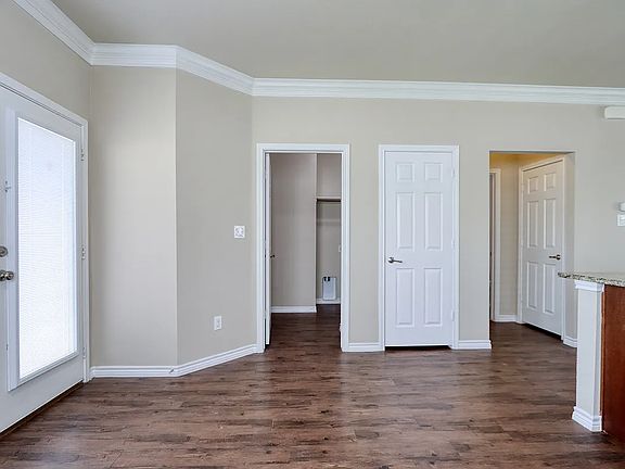View of pantry and laundry room off of kitchen