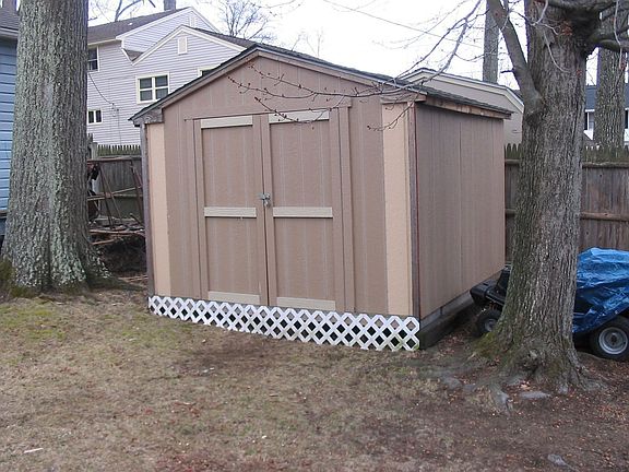 Brand new storage shed in the back yard