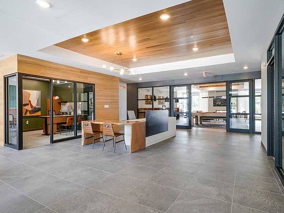 Step into elevated living from the moment you arrive. Our modern lobby sets the tone for comfort, connection, and style at Brynwood at Wilderness Ridge.