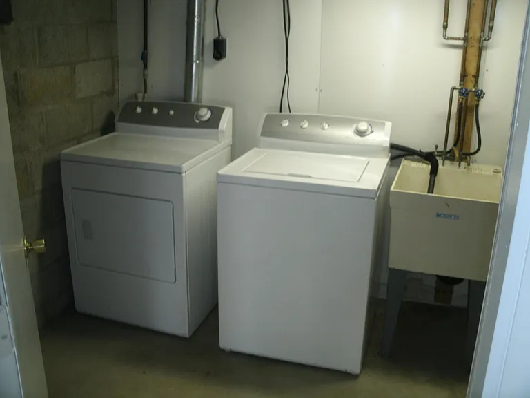 In-unit Washer and Dryer with Laundry Tub.
Convenient Basement Storage space.