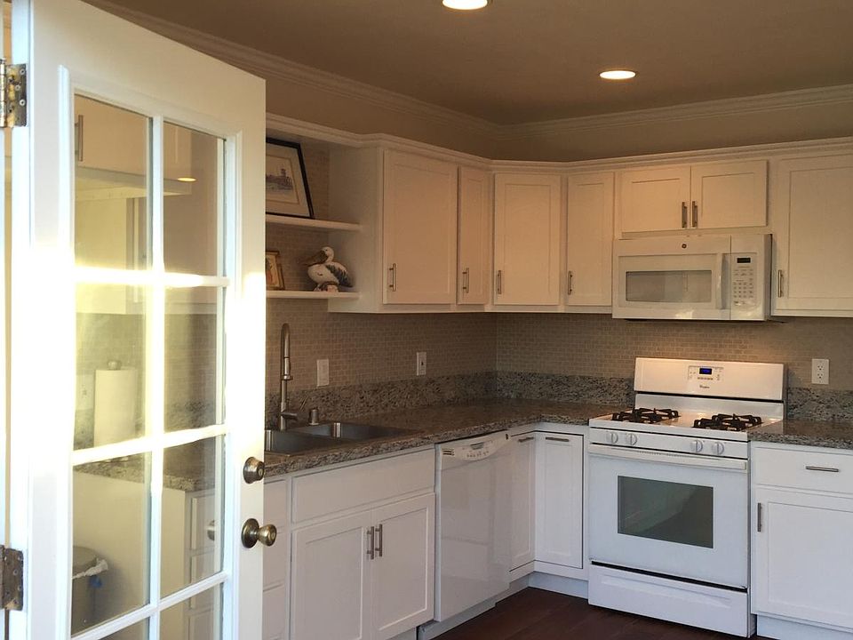 French Doors lead to Patio and New Kitchen