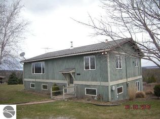 9767 S Cedar Rd, Cedar, MI 49621