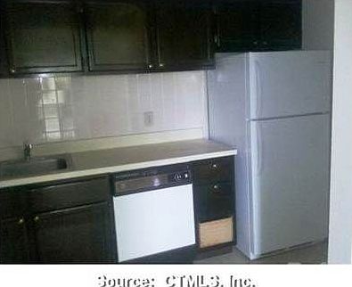 Dishwasher and cabinets galore