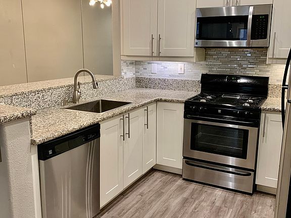 2nd image of 10710 Sabre Hill Dr Unit 128