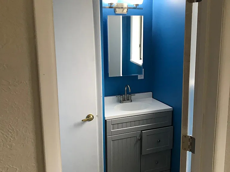 Full bath. Located off bedroom.
