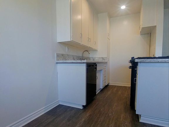 1-Bedroom Kitchen with new $1300 stove, new granite counter tops, new recessed lighting, new sink & gooseneck faucet