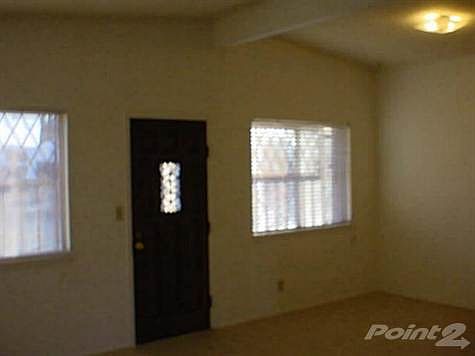Large Family Room with access to Backyard.