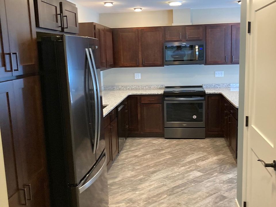 Garage Entry to Kitchen, Guest Bath and Laundry