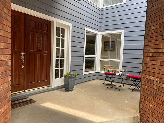 Front porch with room for a table and chairs.
