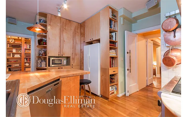 Sold by Douglas Elliman | media 18