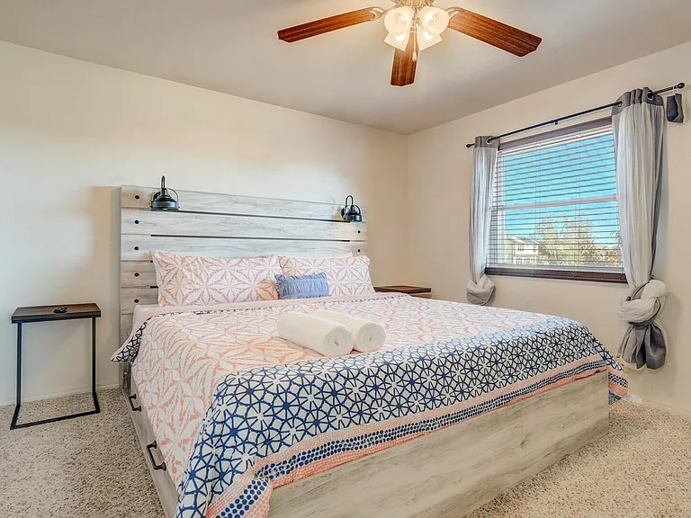King sized bed on the upper level with a TV!