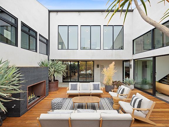 Unwind in the outdoor lounge with fresh air and a crisp fireplace.