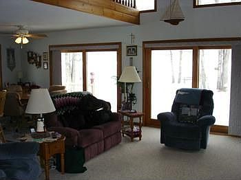 Another view of the living room from the main entry, open the two 8' door walls and listen to the so