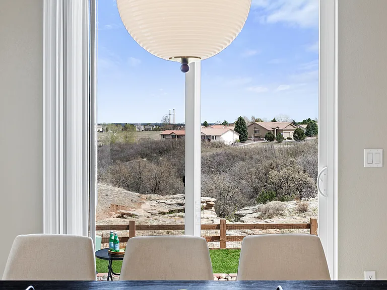 View from dining room which flows onto patio for seamless indoor/outdoor enjoyment