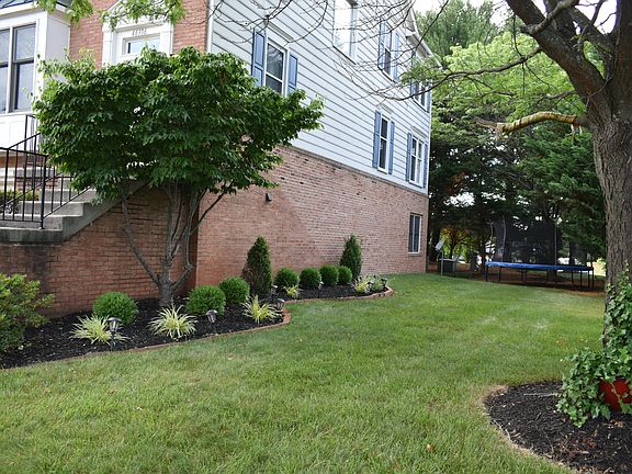Side yard - lawn maintenance is tenant responsibility.