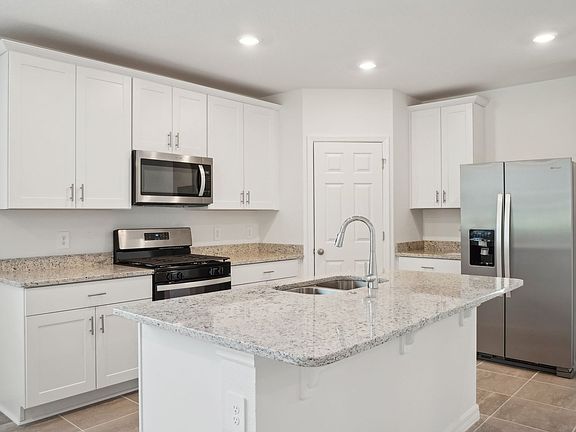 Kitchen in the Daphne floorplan at 5186 Minneola Lane
