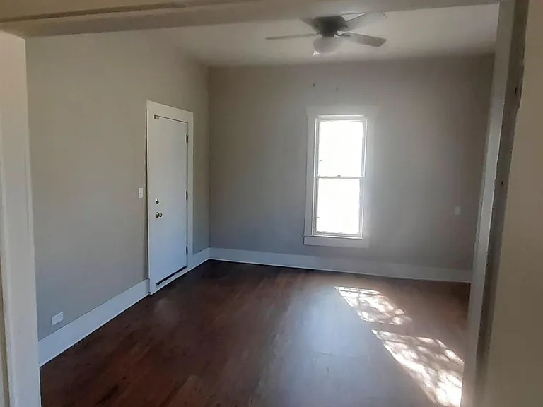 Living room with the front entrance