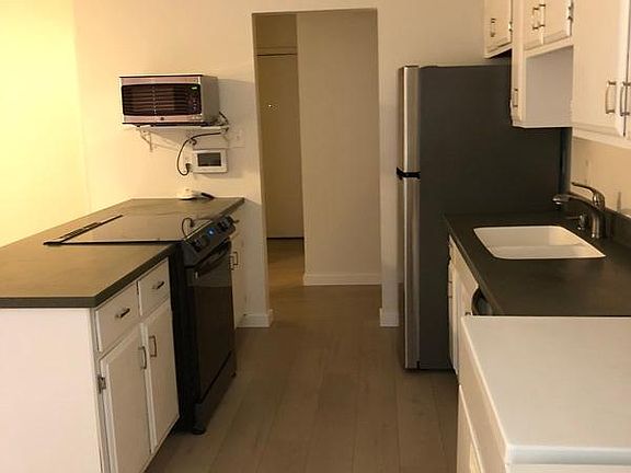 Kitchen off front entry and garage walk door.