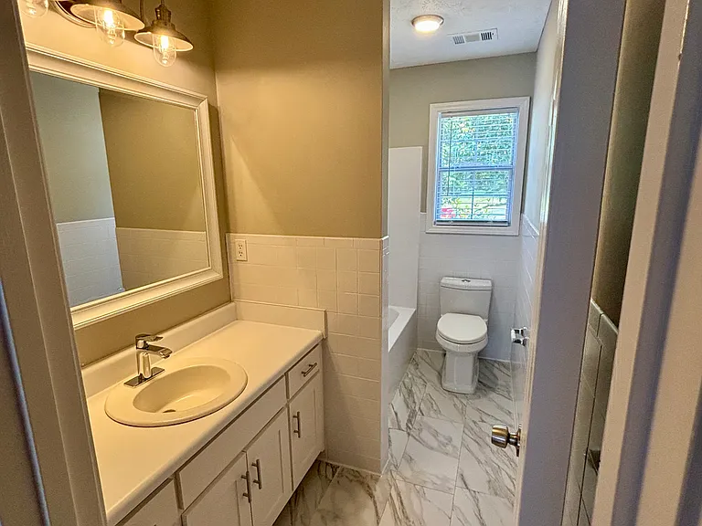 Bathroom shared by #1 and # 2 secondary bedrooms