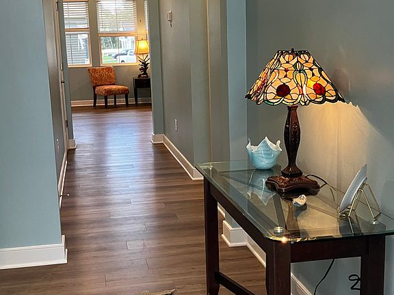 Entry hall looking into Great Room. Alcove entry that leads to laundry room and garage the first doorway on the right,