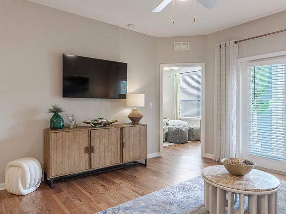 Newly Renovated Living Room with Sleek Hardwood Style Flooring