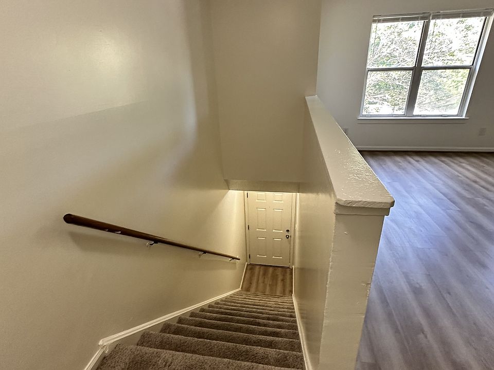 Top of Stairs View Down to Front Door
