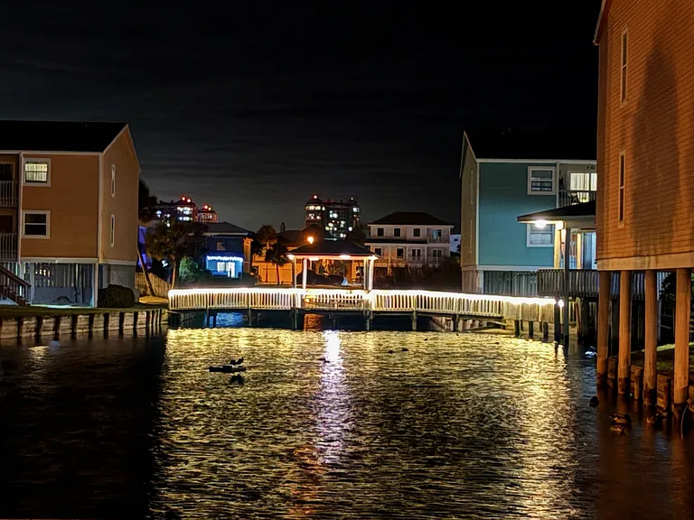 Enjoy the lagoon and boardwalk on property at night