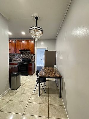 5th image of 466 49th St APT 16
