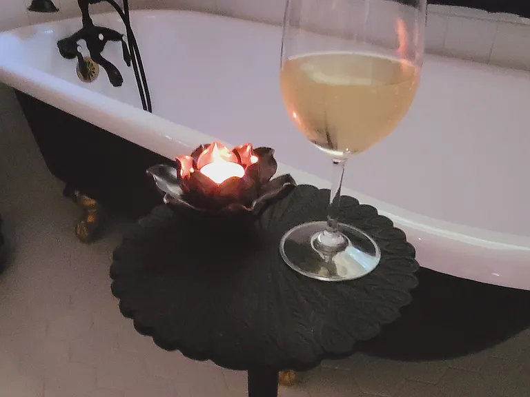 Refinished and newly glazed antique clawfoot tub - ideal for a relaxing soak with a glass of wine!